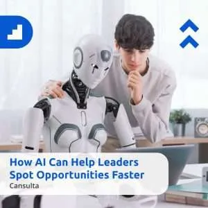Banner image showing a young professional thoughtfully working alongside a humanoid robot at a desk; overlaid text reads “How AI Can Help Leaders Spot Opportunities Faster” with the Cansulta logo.