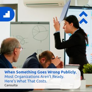 Stressed business team reacting to a public relations crisis and corporate disaster, highlighting the costly impact of poor crisis management and organizational unreadiness. Title says "When Something Goes Wrong Publicly, Most Organizations Aren't Ready. Here's What That Costs" with Cansulta Branding.
