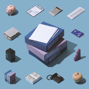 An isometric arrangement of various business and finance icons, including binders, a piggy bank, stacks of cash, and credit cards, surrounding a central stack of blue and purple office binders on a plain blue background, symbolizing comprehensive financial planning and management.