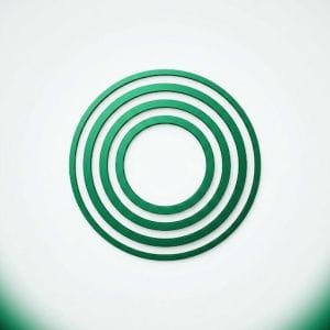A minimalist graphic featuring five concentric green rings of varying thicknesses nesting inside one another, where the expanding or shifting circular layers represent operational cycles, process audits, and systematic iteration, directly visualizing the concept of a "Change Check." The clean design is centered against a light gray background with a soft green and dark vignette border